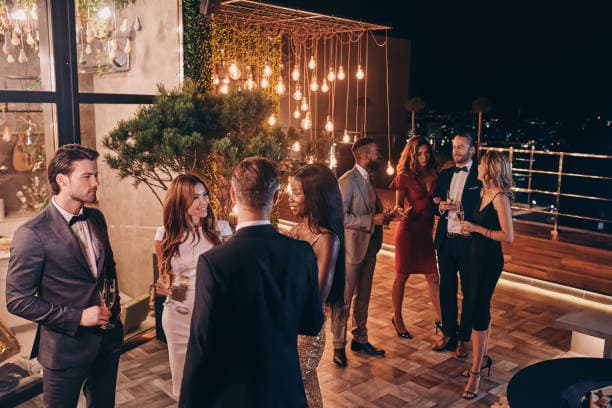 Business leaders in conversation at a professional gathering